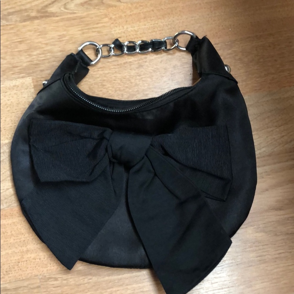 Black evening bag with floppy bow